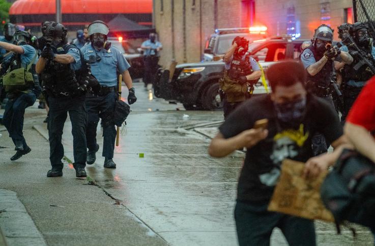 Minneapolis Police fire tear gas at those protesting the May 25th death of George Floyd. Photo: Chad Davis/Flickr